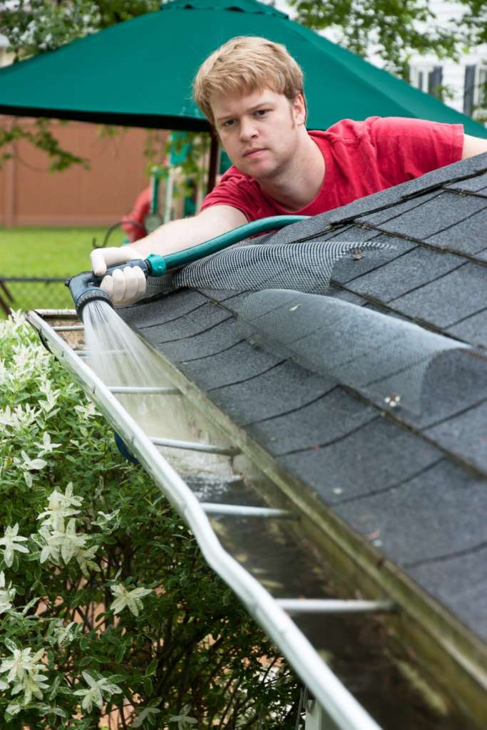 Importance of rinsing gutters after cleaning in portland